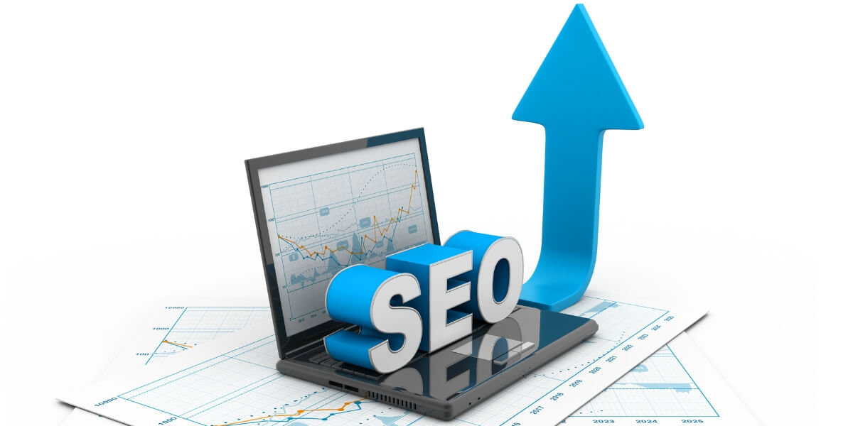 How SEO managers measure market share: Tracking organic search growth 3 Laptop displaying SEO analytics with an upward trend arrow, representing website performance and search ranking growth.